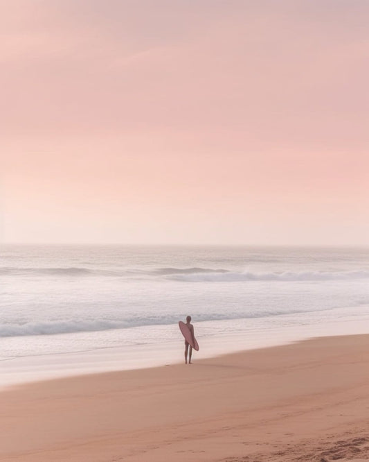 Serene Solitude A Cinematic Shot of a Distant Surfer on an Empty Pink Beach  | Photography Print | Wall Art Picture | Custom Canvas Curators