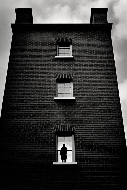 Urban Dreamscape: Brick Building Facade with a Silhouette | Canvas Print | Photography Wall Art | Custom Canvas Curators